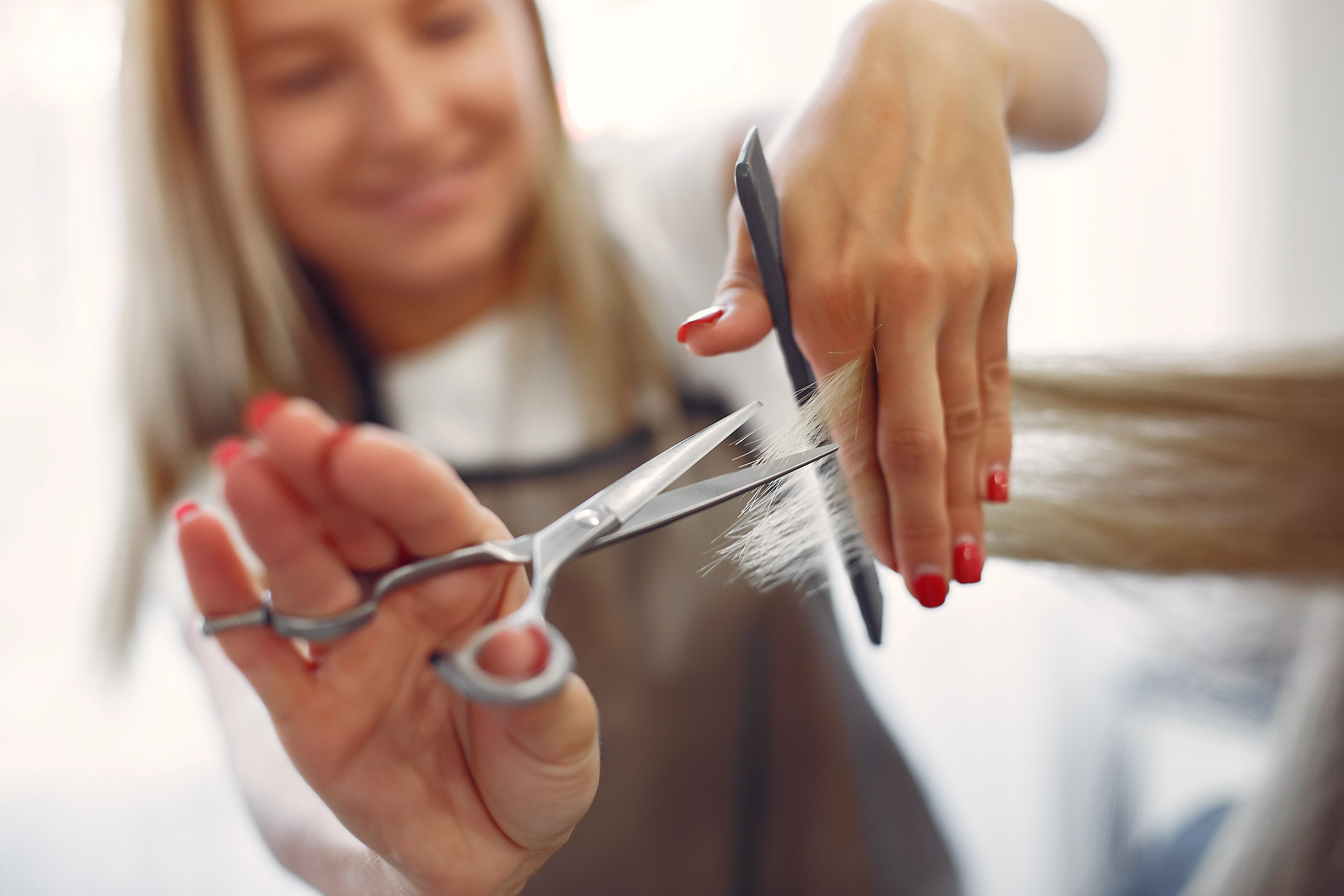 Hairdresser cut hair her client hair salon